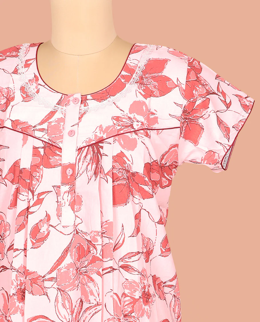 Pale Pink Cotton Nighty Accentuated with Floral Patterns Print, Featuring Lace Work, Round Front Neck, and Half Sleeves