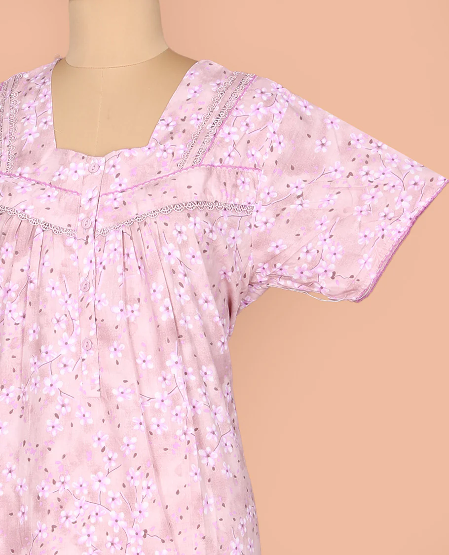 Pale Pink Cotton Nighty Subtly Sparkled with Floral Print, Featuring Lace Work, Square Front Neck, and Half  Sleeves