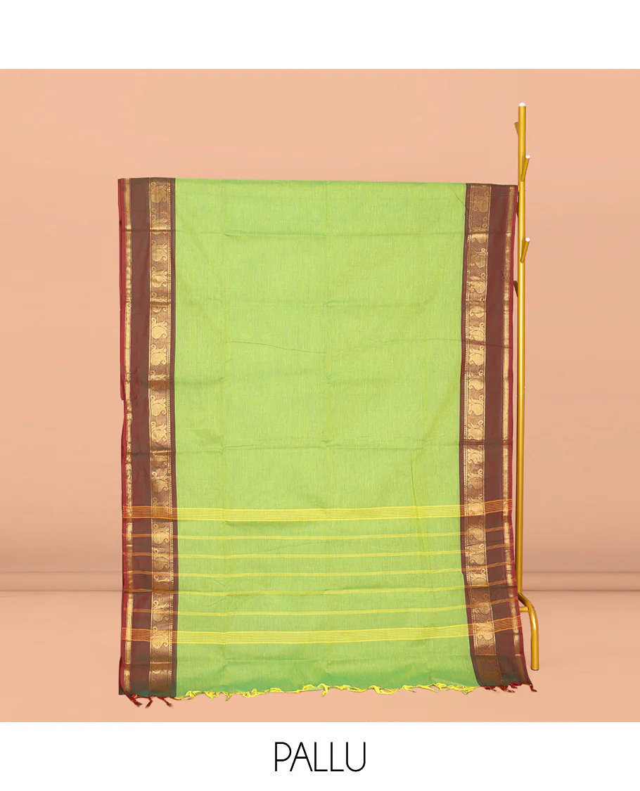 Parrot Green Plain Chettinad Cotton Saree, Complemented by Contrast Traditional Zari Design Rettai Pettu Border of Paisleys, Striped Pallu, and Paired with Matching Blouse - Image 2