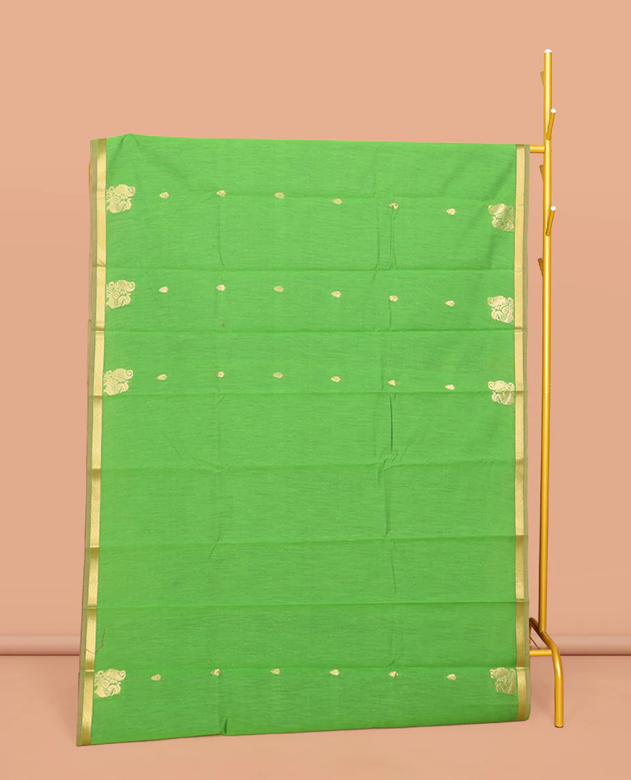 Parrot Green Semi-Silk Cotton Saree, Adorned with Buttas and Peacock Buttas All Over Its Body, Complemented by a Contrast Piping Border, Pallu of Peacock Butta Enclosed in a Checked Design, and Paired with a Contrast Blouse