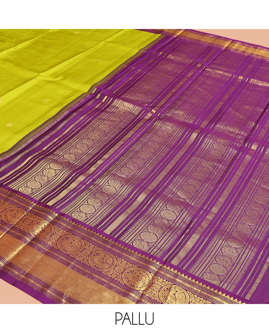 Parrot Green Vasundhara Silk Saree, Enriched with Sparse Stripes and Zari Buttas, Complemented by a Contrast Border of Thilakam, Banaras, Muthu, and Round Mayil Designs, Pallu Steeped with Traditional Designs, and Paired with a Contrast Blouse - Image 10