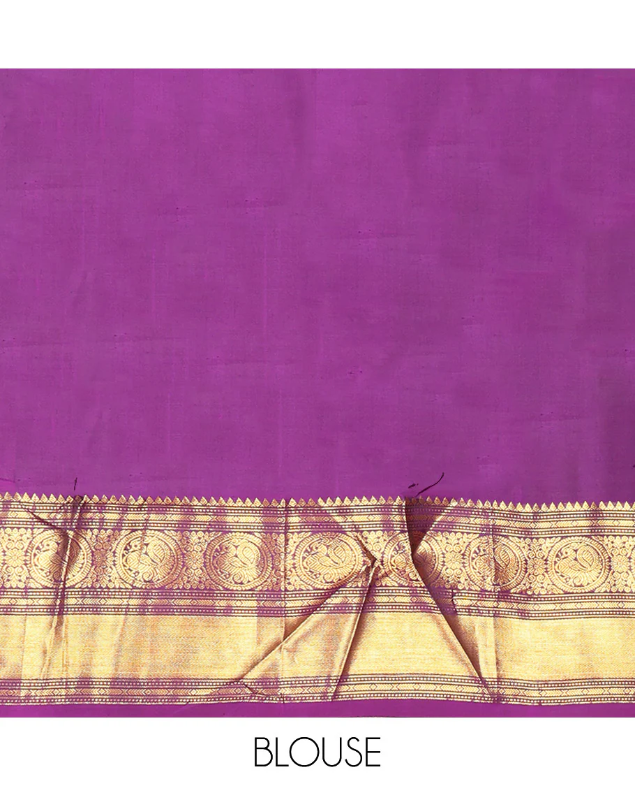 Parrot Green Vasundhara Silk Saree, Enriched with Sparse Stripes and Zari Buttas, Complemented by a Contrast Border of Thilakam, Banaras, Muthu, and Round Mayil Designs, Pallu Steeped with Traditional Designs, and Paired with a Contrast Blouse - Image 11