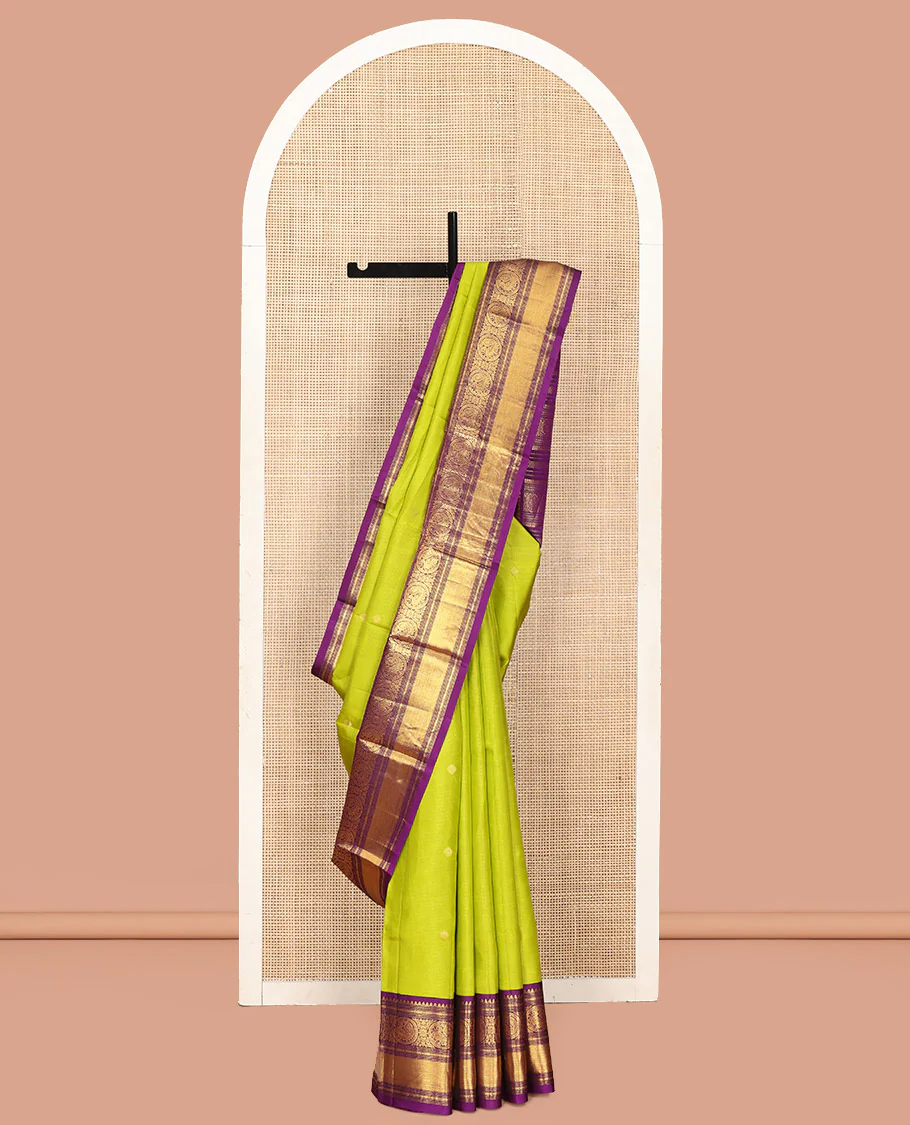 Parrot Green Vasundhara Silk Saree, Enriched with Sparse Stripes and Zari Buttas, Complemented by a Contrast Border of Thilakam, Banaras, Muthu, and Round Mayil Designs, Pallu Steeped with Traditional Designs, and Paired with a Contrast Blouse - Image 6