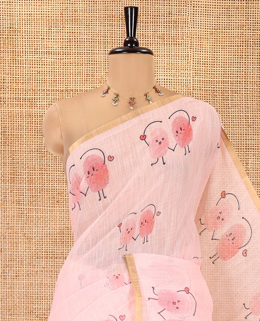 Peach Linen Cotton Saree, Creatively Printed with Thumb Finger Printed Cartoon-Theme Print on Its Body, a Subtle Piping Border, a Self-Printed Pallu, and Paired with a Matching Blouse - Image 2
