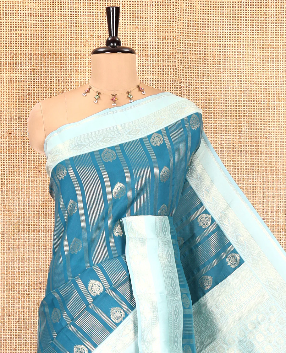 Peacock Blue Litchi Saree, Elevated with Vaira Oosi Stripes and Zari Buttas on Its Body, Complemented by a Contrast Rettai Pettu Traditional Zari Design Border, an Intricately Designed Pallu, and Paired with a Contrast Blouse - Image 2