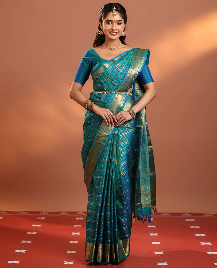 Neelambhari - Peacock Blue Vasundhara Silk Saree Gleamed Up with Zari Buttas Enclosed in Zari Checks, Featuring a Zari Border of Kuthirai and Chakra Designs, Rich Zari Pallu, with a Matching Blouse - Image 4