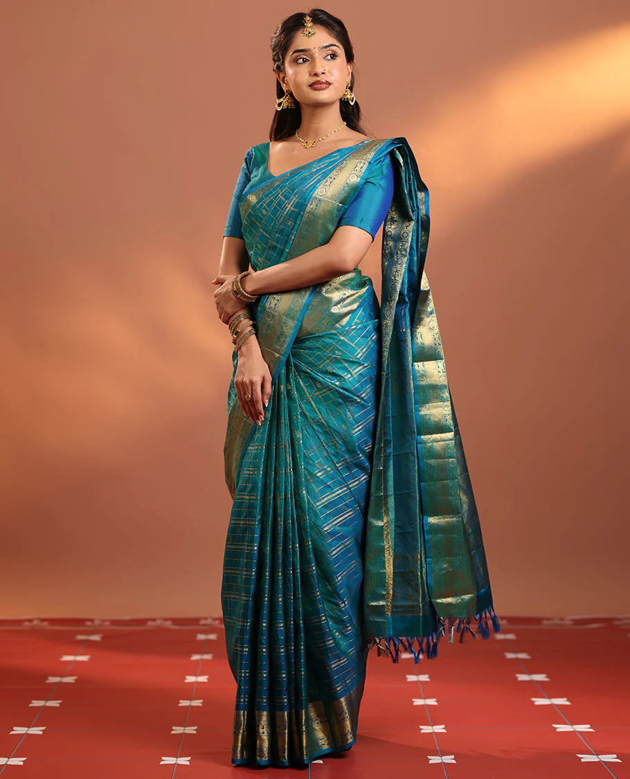Neelambhari - Peacock Blue Vasundhara Silk Saree Gleamed Up with Zari Buttas Enclosed in Zari Checks, Featuring a Zari Border of Kuthirai and Chakra Designs, Rich Zari Pallu, with a Matching Blouse - Image 7