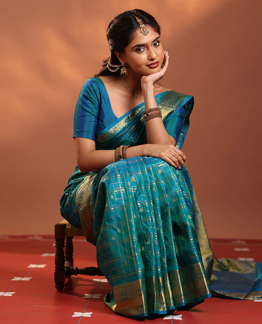 Neelambhari - Peacock Blue Vasundhara Silk Saree Gleamed Up with Zari Buttas Enclosed in Zari Checks, Featuring a Zari Border of Kuthirai and Chakra Designs, Rich Zari Pallu, with a Matching Blouse - Image 8