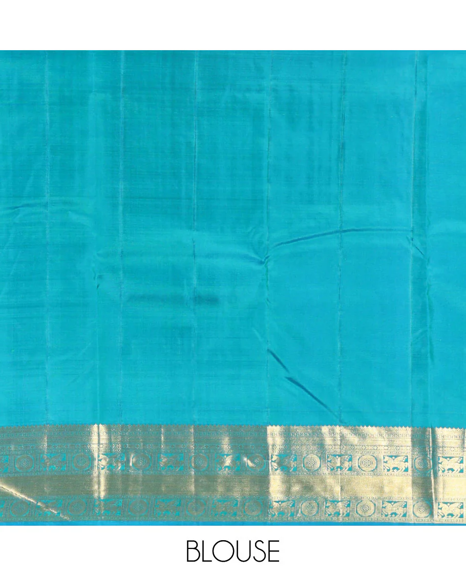 Neelambhari - Peacock Blue Vasundhara Silk Saree Gleamed Up with Zari Buttas Enclosed in Zari Checks, Featuring a Zari Border of Kuthirai and Chakra Designs, Rich Zari Pallu, with a Matching Blouse - Image 9