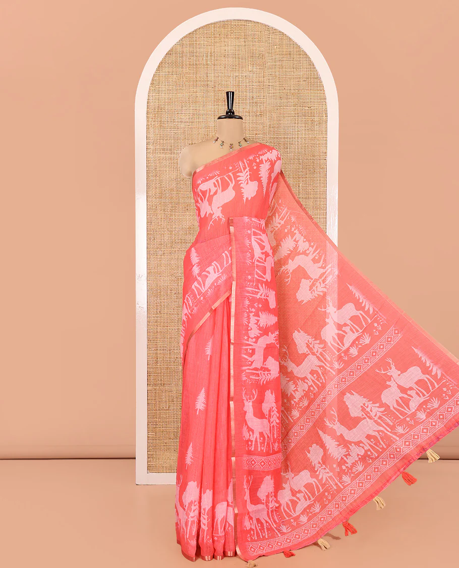 Pink Christmas-Themed Linen Cotton Saree, Elevated with Christmas Tree Motifs Printed on Its Body, a Subtle Piping Border, Pallu of Christmas-Themed Print, and Paired with a Contrast Floral Printed Blouse