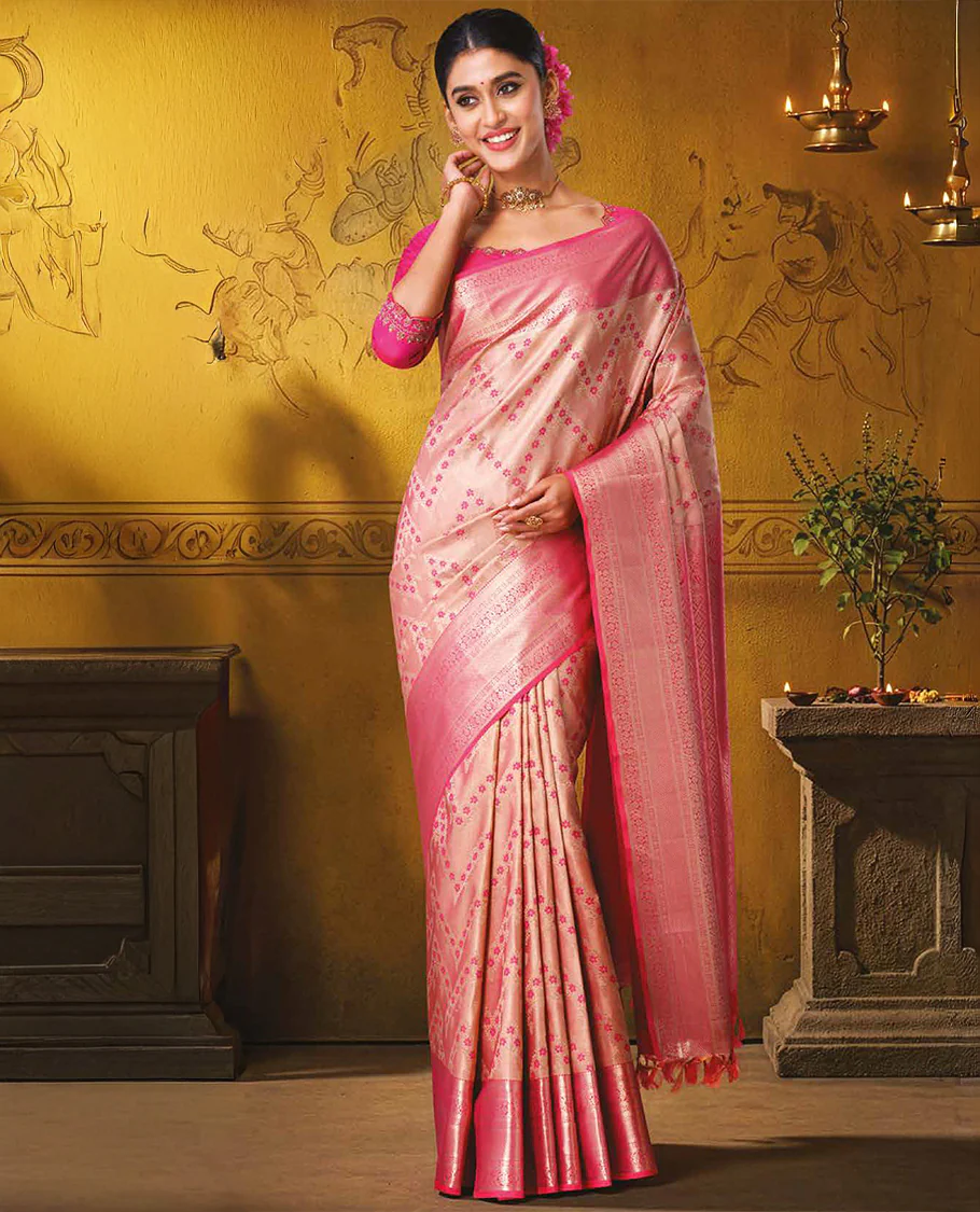 Pink floral chevron jacquard Kanchipuram wedding silk saree, contrast traditional zari design border, and jaal pallu