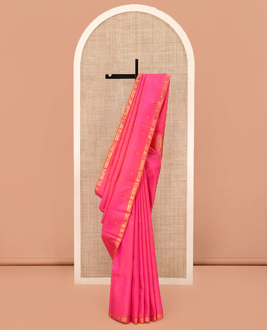 Pink Kanchipuram Silk Saree, Decked Up with Zari Buttas All Over Its Body, Complemented by Contrast Zari Piping Border, Pallu of Big Paisleys, and Paired with a Matching Blouse