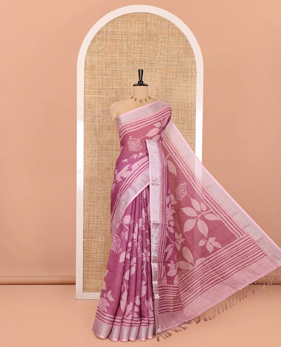 Pink Linen Cotton Saree, Beautified with Floral Leaf Motifs Printed on Its Body, Subtle Bavanji Border, Pallu Features Floral Print and Stripes, and Paired with a Matching Blouse