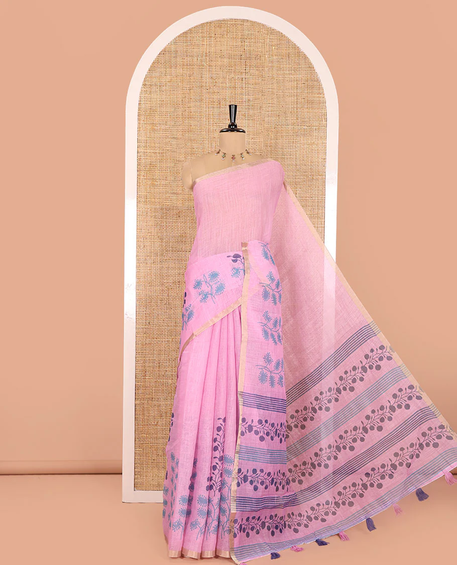 Pink Linen Saree, Adorned with Floral Motifs Printed on Its Body, a Subtle Piping Border, Pallu Steeped with Floral Motifs and Stripes, and Paired with a Contrast Blouse