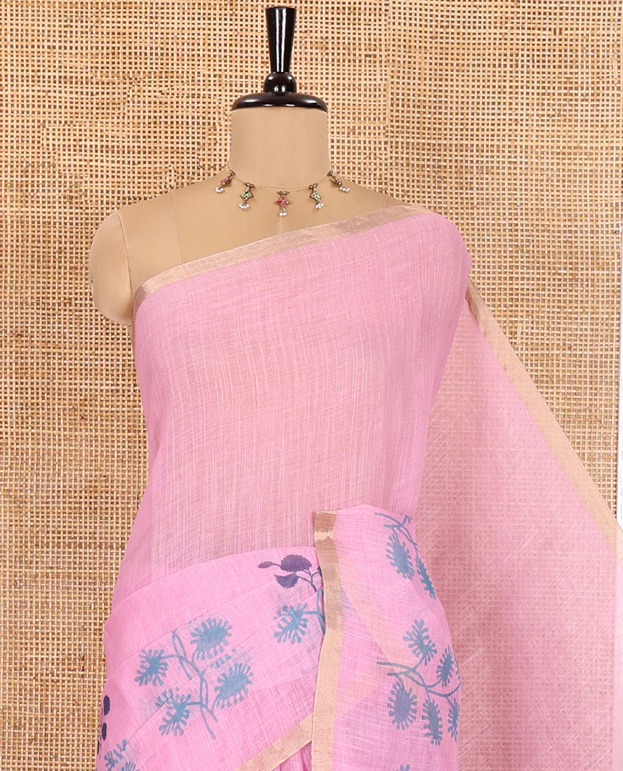Pink Linen Saree, Adorned with Floral Motifs Printed on Its Body, a Subtle Piping Border, Pallu Steeped with Floral Motifs and Stripes, and Paired with a Contrast Blouse - Image 2