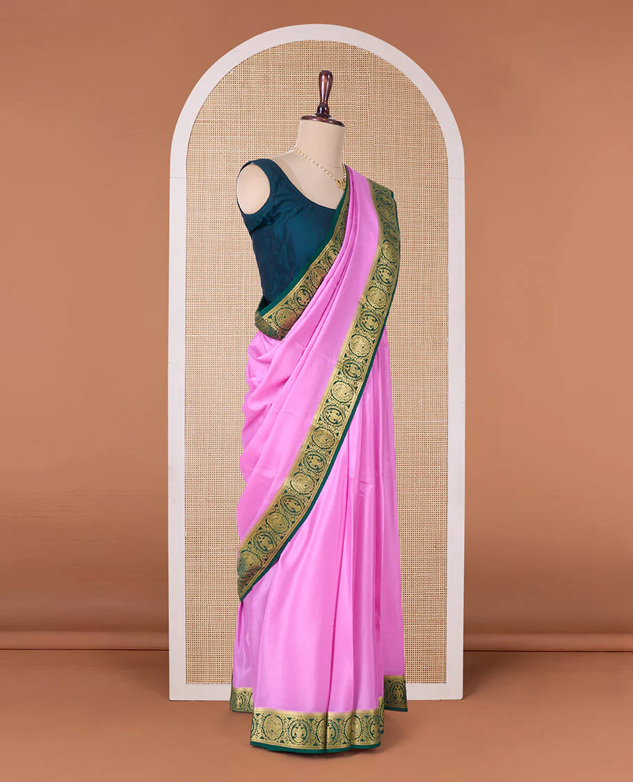 Pink plain Mysore silk saree, contrast border of two-headed eagle, and yaali designs, and zari striped pallu