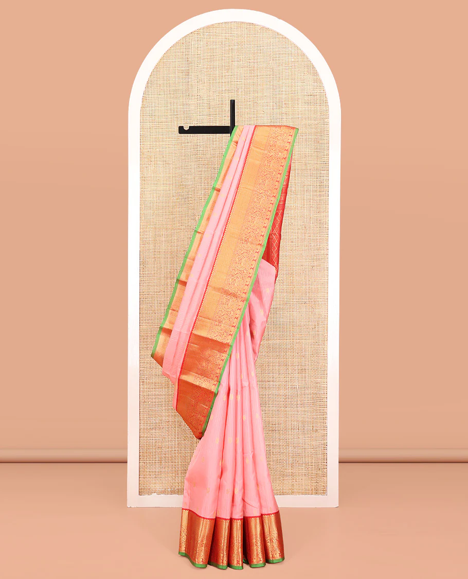 Pink Vasundhara Silk Saree, Decked Up with Zari Buttas and Stripes All Over Its Body, Complemented by a Contrast Border of Rekku, Kodi Visiry, Jaal, and Mayil Designs, Grand Jaal Pallu, and Paired with a Contrast Blouse