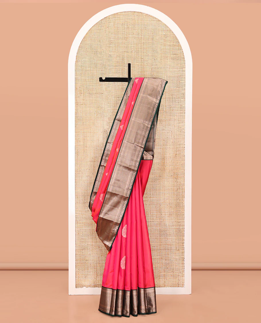 Pink Vasundhara Silk Saree, Gleamed Up with Zari Buttas All Over Its Body, Complemented by a Contrast Border of Kathir, and Jaal Designs, Grand Jaal Pallu, and Paired with a Contrast Blouse