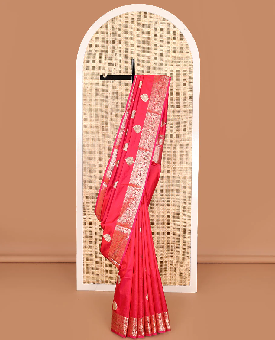 Pink zari buttas kathan silk saree, traditional border of paisley creeper designs, and jaal pallu