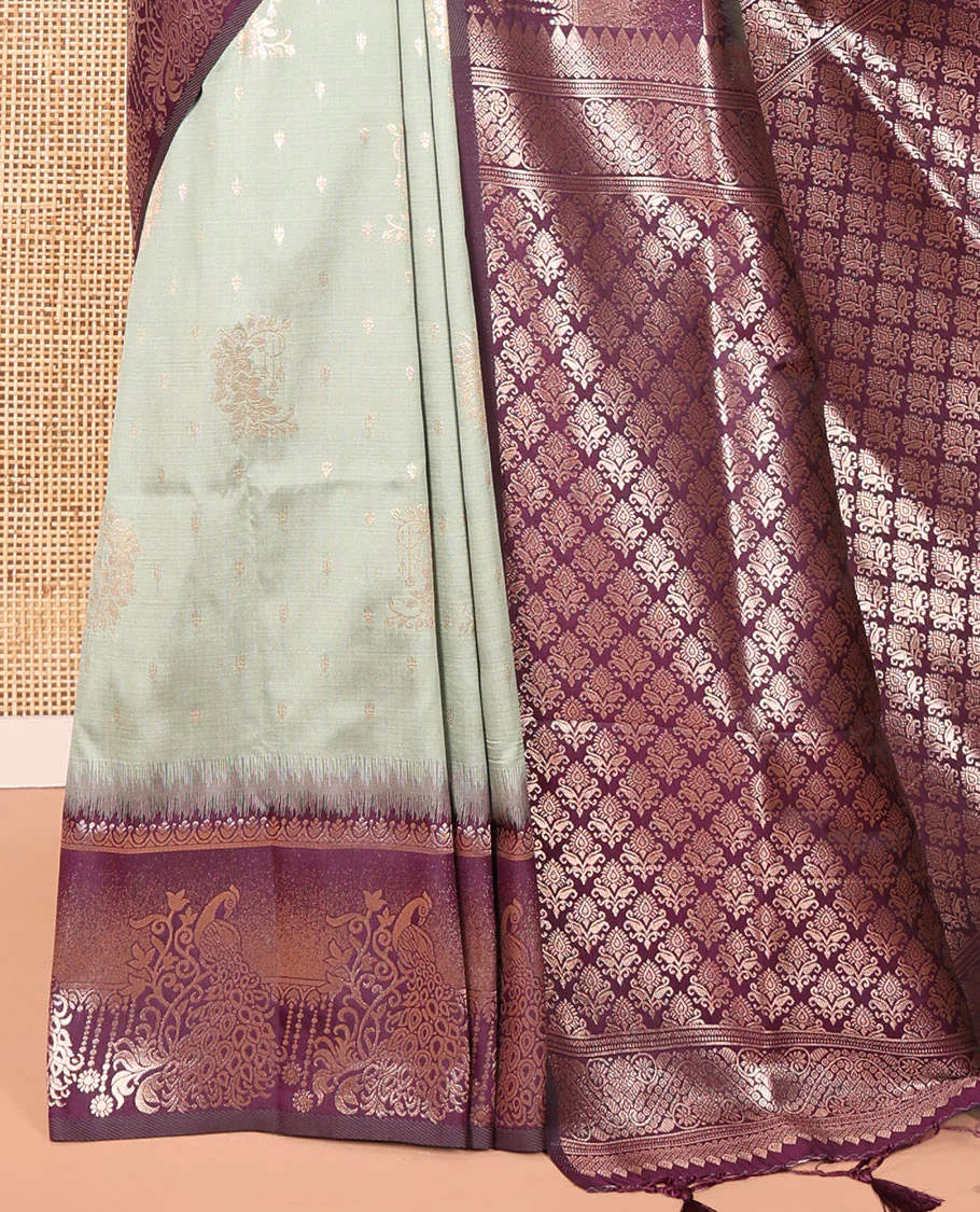 Pista Green Elite Soft Silk Saree, Featuring Zari Buttas on Its Body, Complemented by a Contrast Peacock-Floral Zari Blouse, Intricately Designed Pallu, and Paired with a Contrast Blouse - Image 3