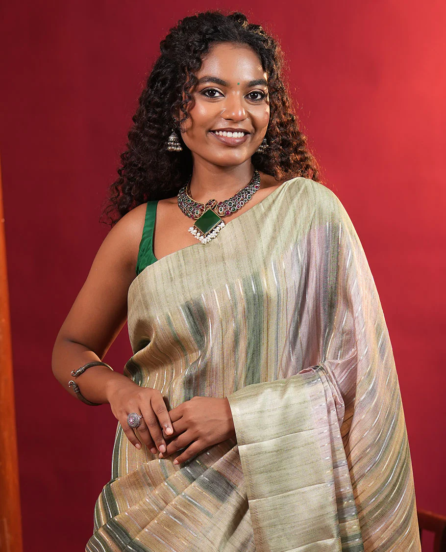 Pista Green Striped Semi-Tussar Silk Saree, Adorned with Vertical Zari Stripes on Its Body, Subtle Zari Border, a Subtle Pallu, and Paired with a Contrast Striped Blouse - Image 2