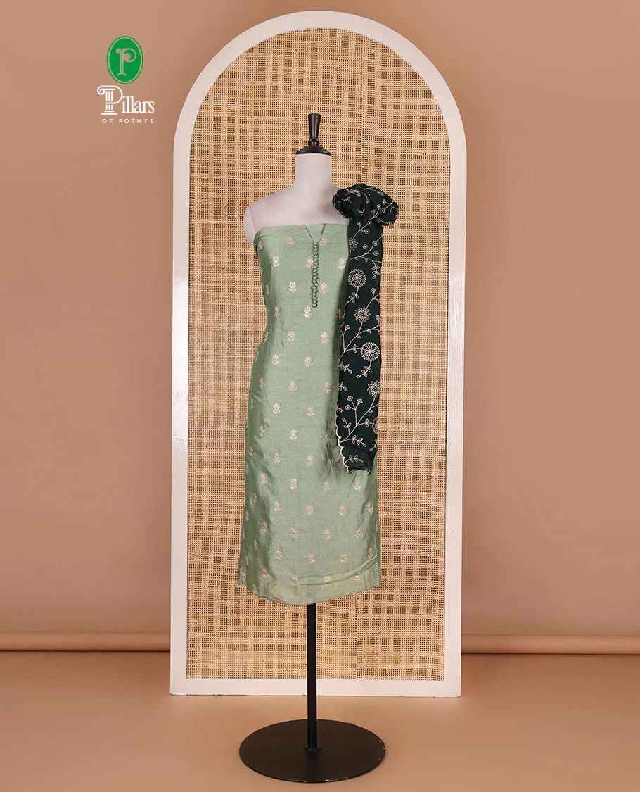 Pista green Vichitra silk material churidar set, floral motifs embroidered top, contrast Santoon bottom, and floral vine thread embroidered scallop dupatta