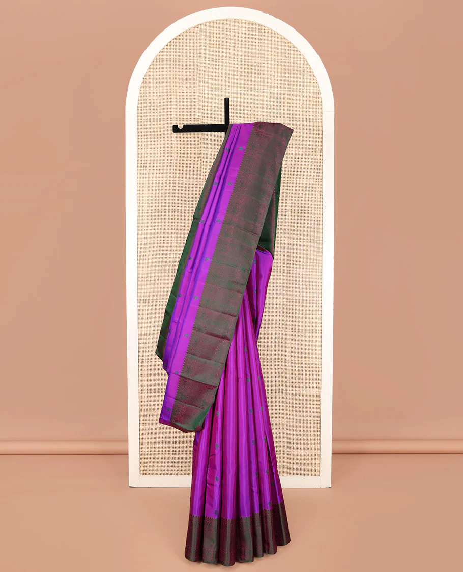 Purple Kanchipuram Silk Saree, Adorned with Diamond and Mayil Thread Buttas on Its Body, Complemented by a Contrast Border of Thilakam Mokku, Iruthalai Pakshi, and Kuyil Kann Designs, Pallu of Jaal Designs, and Paired with a Contrast Blouse
