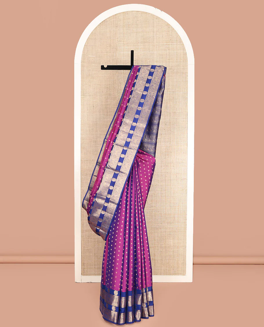 Purple Vasundhara Lite-Silk Mix Saree, Decorated with Buttas All Over Its Body, Complemented by a Contrast Border Steeped with Mayil Designs, Grandly Pallu of Mayil Designs, and Paired with a Contrast Blouse