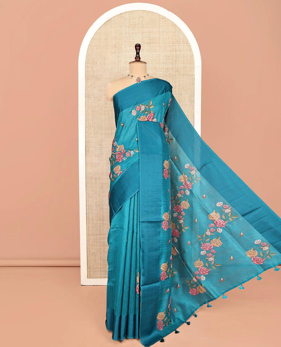 Rama Blue Green-Silk Saree, Colorfully Highlighted with Rose Motifs Cross Stitch Embroidery on Its Body, Subtly Sparkled by a Plain Border, Pallu of Rose Cross Stitch Embroidery, and Paired with a Contrast Blouse - Image 7