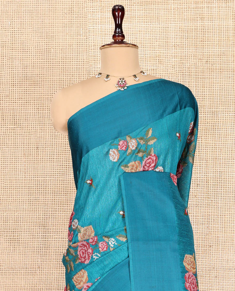 Rama Blue Green-Silk Saree, Colorfully Highlighted with Rose Motifs Cross Stitch Embroidery on Its Body, Subtly Sparkled by a Plain Border, Pallu of Rose Cross Stitch Embroidery, and Paired with a Contrast Blouse - Image 8