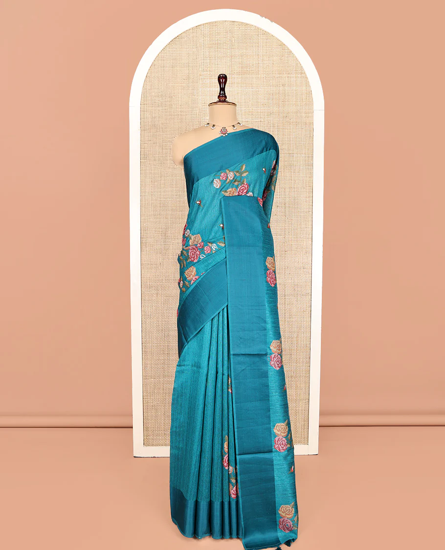 Rama Blue Green-Silk Saree, Colorfully Highlighted with Rose Motifs Cross Stitch Embroidery on Its Body, Subtly Sparkled by a Plain Border, Pallu of Rose Cross Stitch Embroidery, and Paired with a Contrast Blouse - Image 9