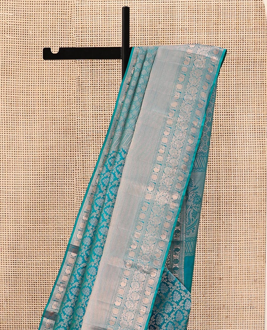 Rama Blue Kanchipuram Wedding Silk Saree, Mesmerized with Jaal Jacquard on Its Body, Highlighted by a Zari Border of Thilakam Mokku, Poun, Mayil, and Kodi Visiry Designs, Grand Pallu Steeped with Chakram Designs, and Paired with a Matching Blouse - Image 3