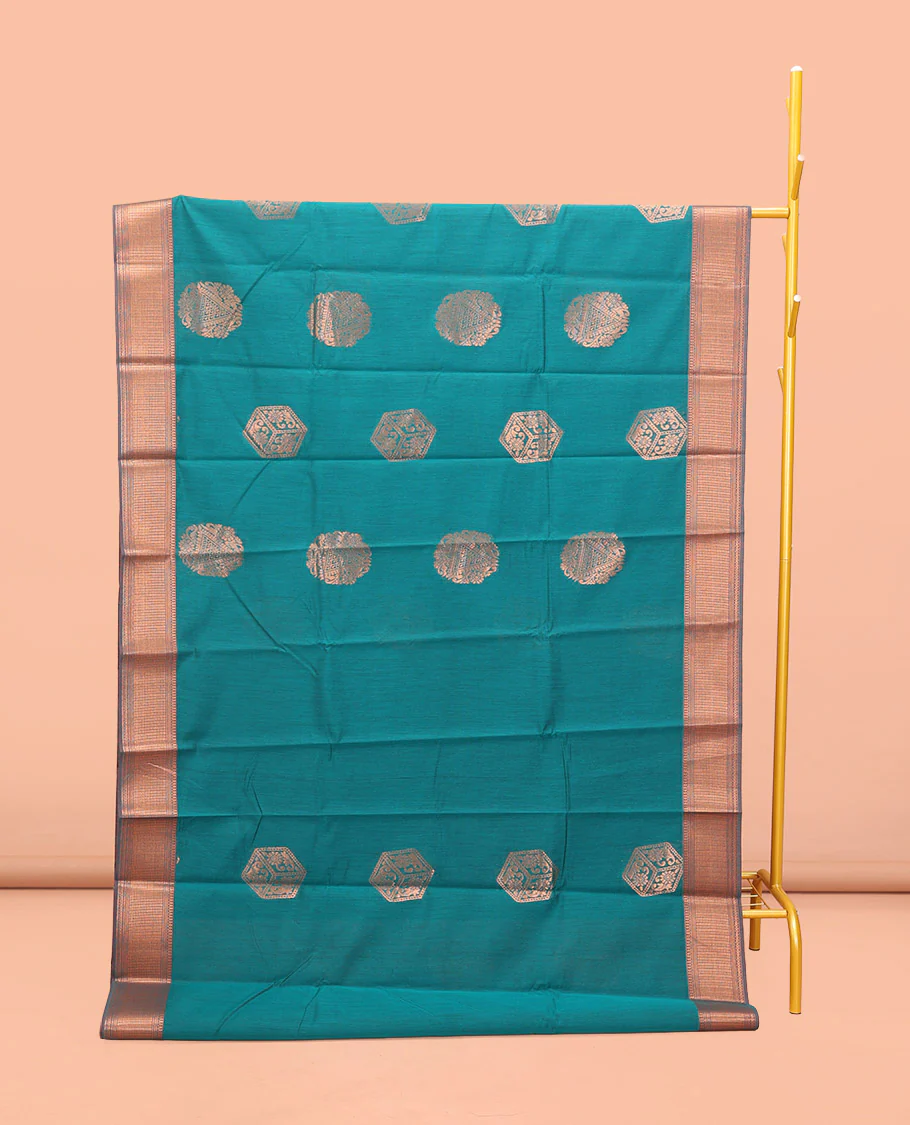 Rama Blue Semi-Silk Cotton Saree, Spotlighted with Zari Buttas All Over Its Body, Highlighted by a Traditional Zari Border, Pallu of Paisley Designs, and Paired with a Matching Blouse