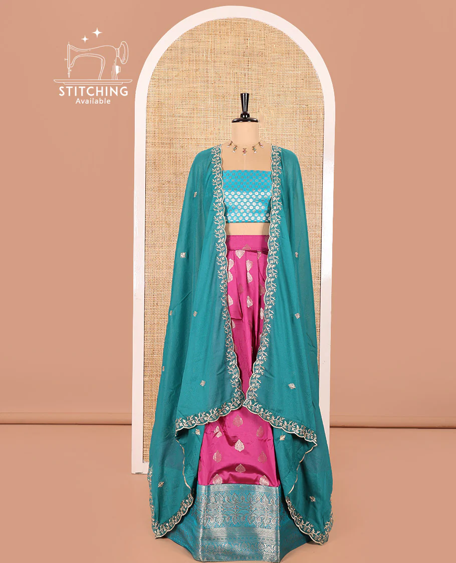 Rani Pink and Ferozi Color Semi-Banaras Silk Half-Saree Featuring Zari Buttas All Over the Skirt, Highlighted with a Contrast Traditional Zari Design Border, Rudraksham Motifs Woven Blouse, and a Shimmer Georgette Scallop-Embroidered Dhavani - Image 2