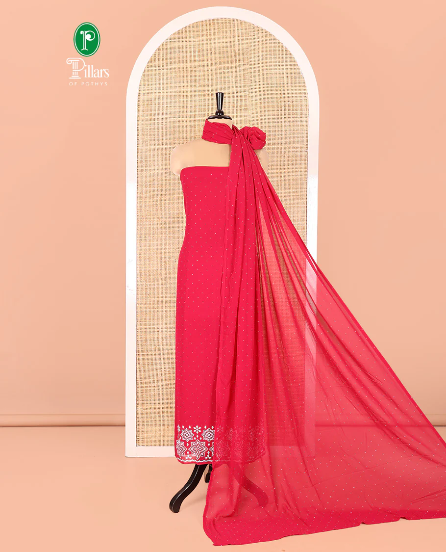 Rani Pink Fox Georgette Material Chudidar Set, Gleamed up with Stone Floral Embroidery On Its Top, A Plain Santoon Bottom and Paired with a Matching Stone Work Fox Georgette Dupatta
