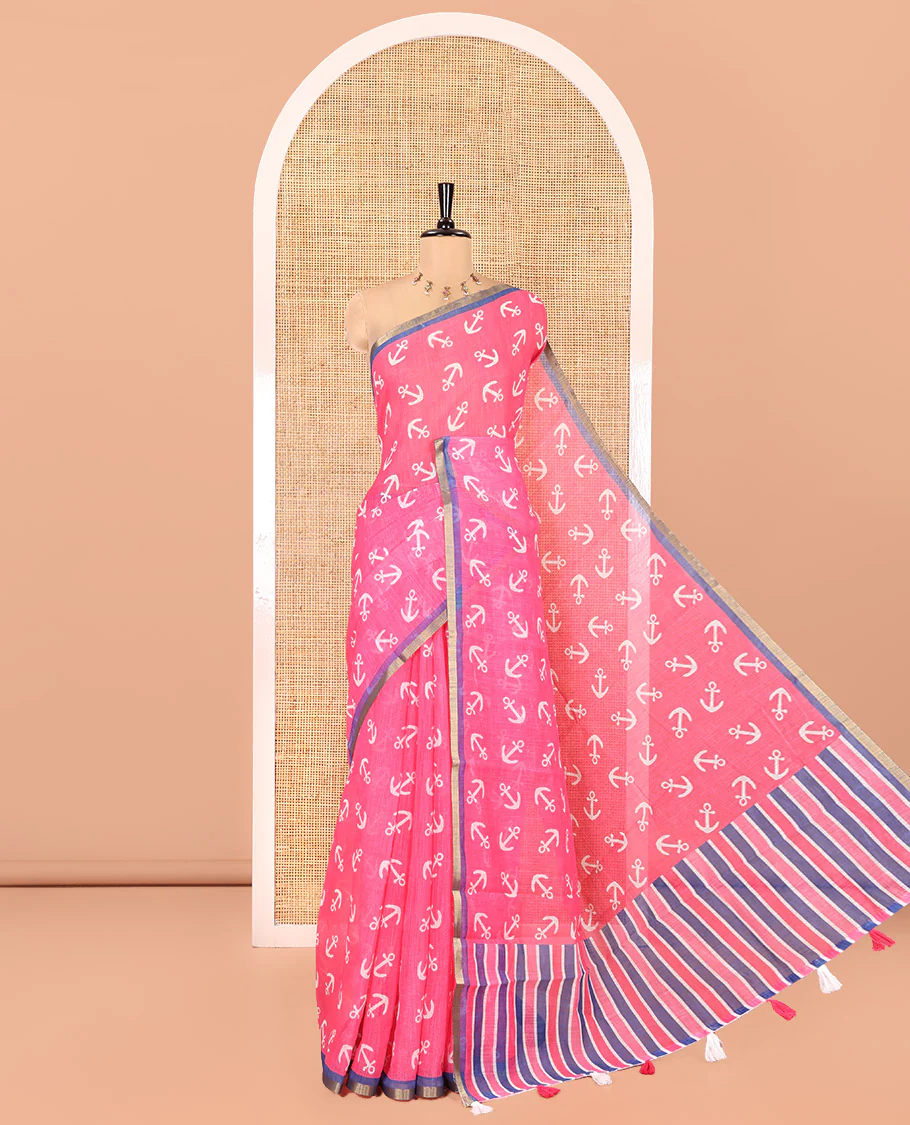 Rani Pink Linen Cotton Saree, Accentuated with Anchor Motifs Printed on Its Body, a Subtle Contrast Piping Border, Multi-Color Striped Pallu, and Paired with a Contrast Blouse