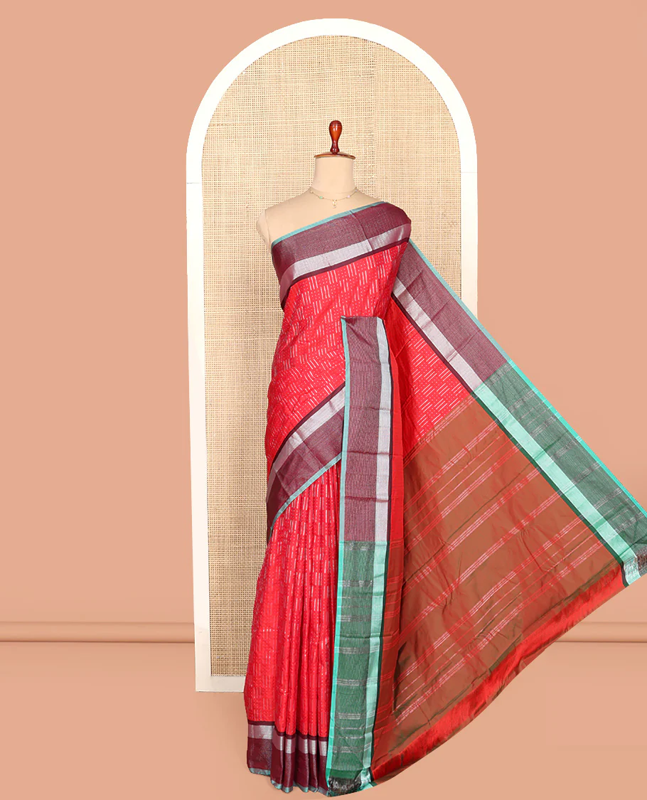 Red Aarani Silk Saree, Steeped in Richness of Zari Buttas All Over Its Body, Complemented by a Contrast Border, Pallu of Stripes, and Paired with a Contrast Blouse