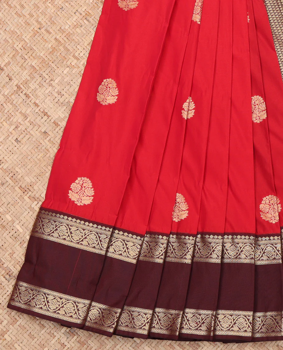 Red Budget Silk Saree, Accentuated with Zari Buttas All Over Its Body, Complemented by a Contrast Traditional Zari Rettai Pettu Border of Floral Creeper Designs, Gleaming Jaal Pallu, and Paired with a Contrast Blouse