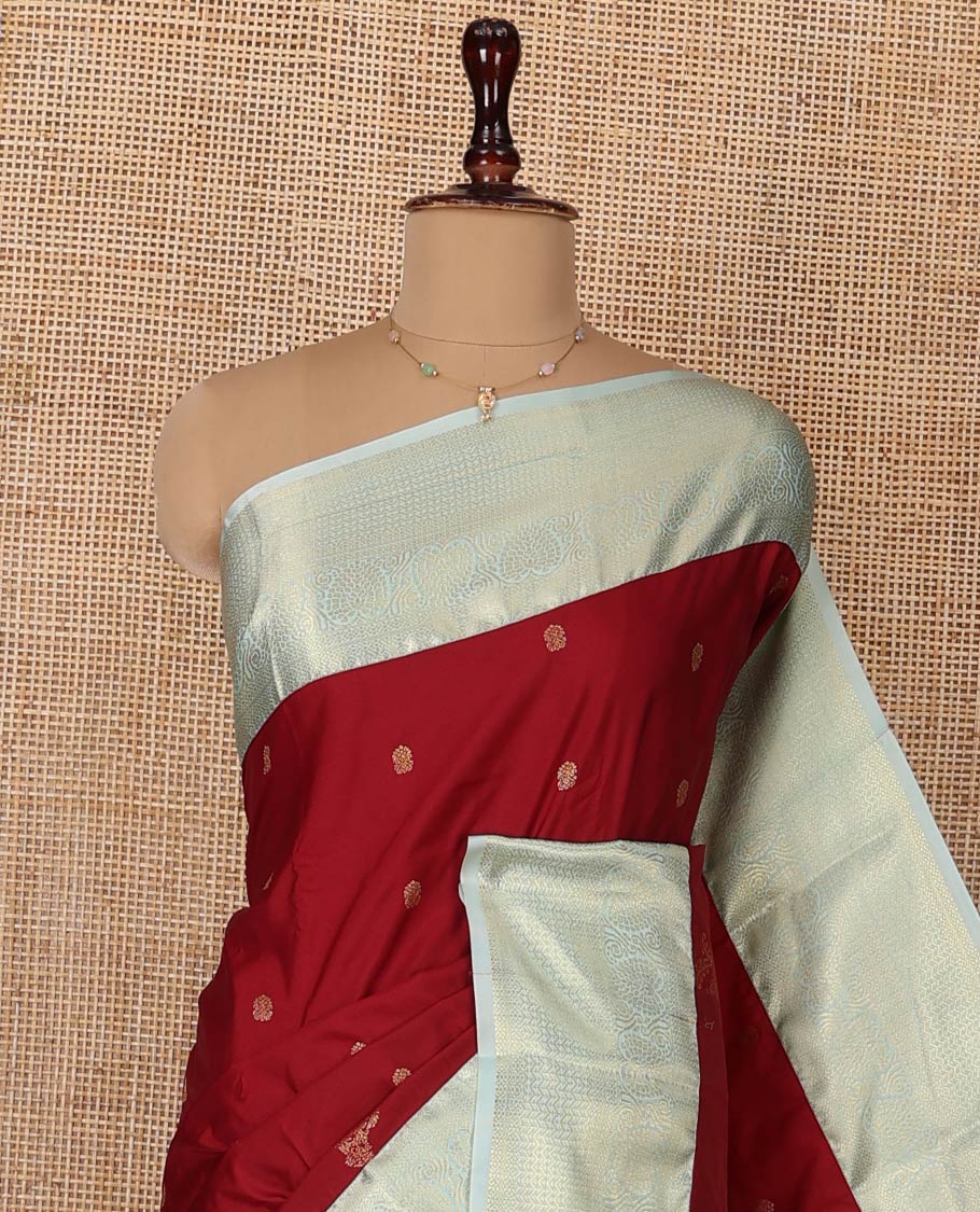 Red Budget Silk Saree, Elegantly Highlighted with Zari Buttas All Over Its Body, Complemented by a Contrast Traditional Zari Designs Woven Border, Opulently Embellished Pallu, and Paired with a Contrast Blouse - Image 2
