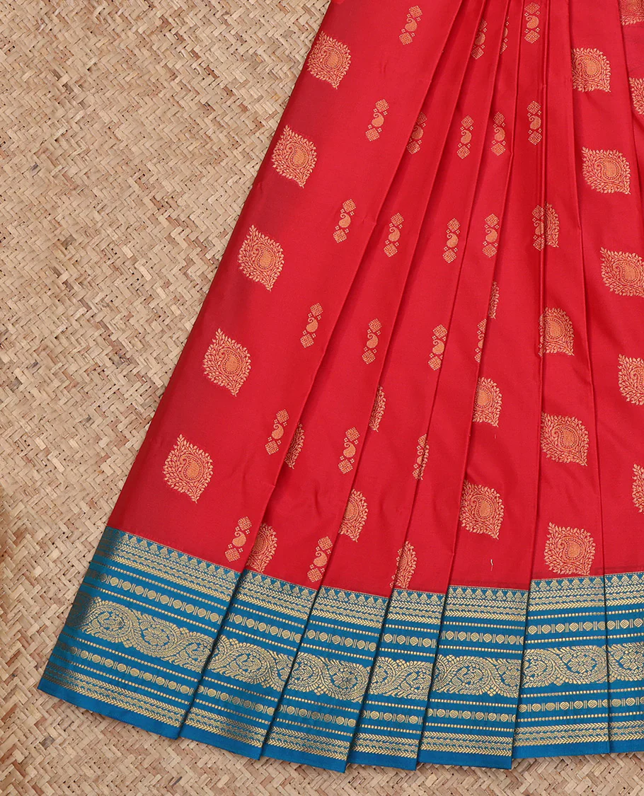 Red Budget Silk Saree, Graced with Zari Buttas All Over Its Body, Complemented by a Contrast Traditional Zari Border, Grand Geometric-Patterned Pallu, and Paired with a Contrast Blouse