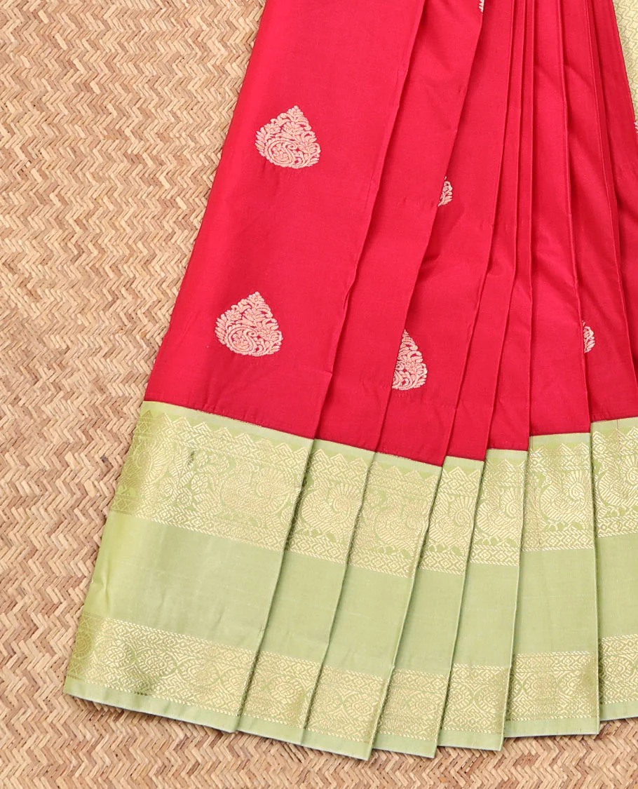 Red Budget Silk Saree, Showcasing Zari Buttas on Its Body, Complemented by a Contrast Traditional Zari Design Rettai Pettu Border, Grand Jaal Pallu, and Paired with a Contrast Blouse