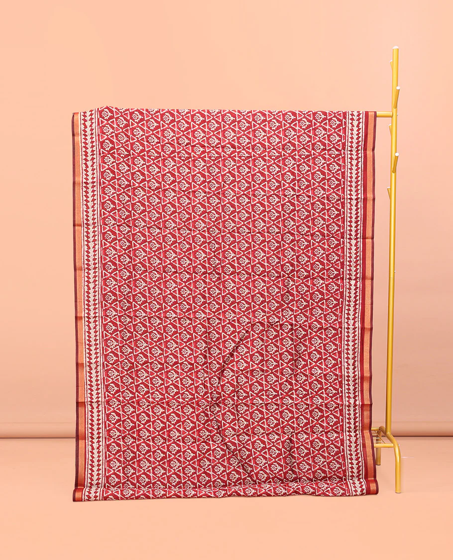 Red Kanchi Cotton Saree, Featuring Floral and Triangle Print All Over Its Body, a Subtle Border, Pallu of Floral Vine and Triangle Print, and Paired with a Contrast Blouse