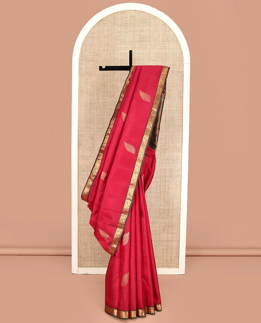 Red Kanchipuram Silk Saree, Woven with Zari Buttas All Over Its Body, Complemented by a Contrast Border of Mayil Designs, Intricately Designed Pallu, and Paired with a Contrast Blouse