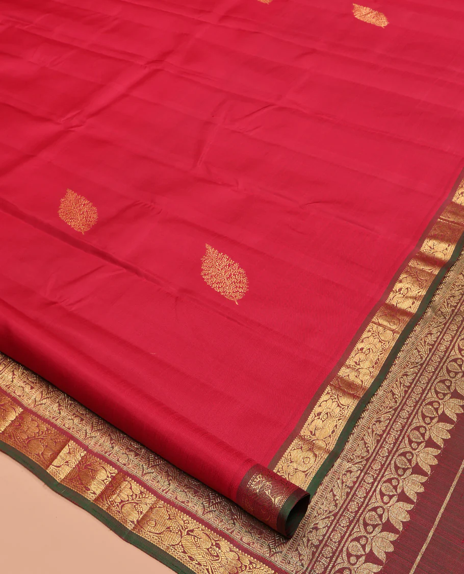 Red Kanchipuram Silk Saree, Woven with Zari Buttas All Over Its Body, Complemented by a Contrast Border of Mayil Designs, Intricately Designed Pallu, and Paired with a Contrast Blouse - Image 2