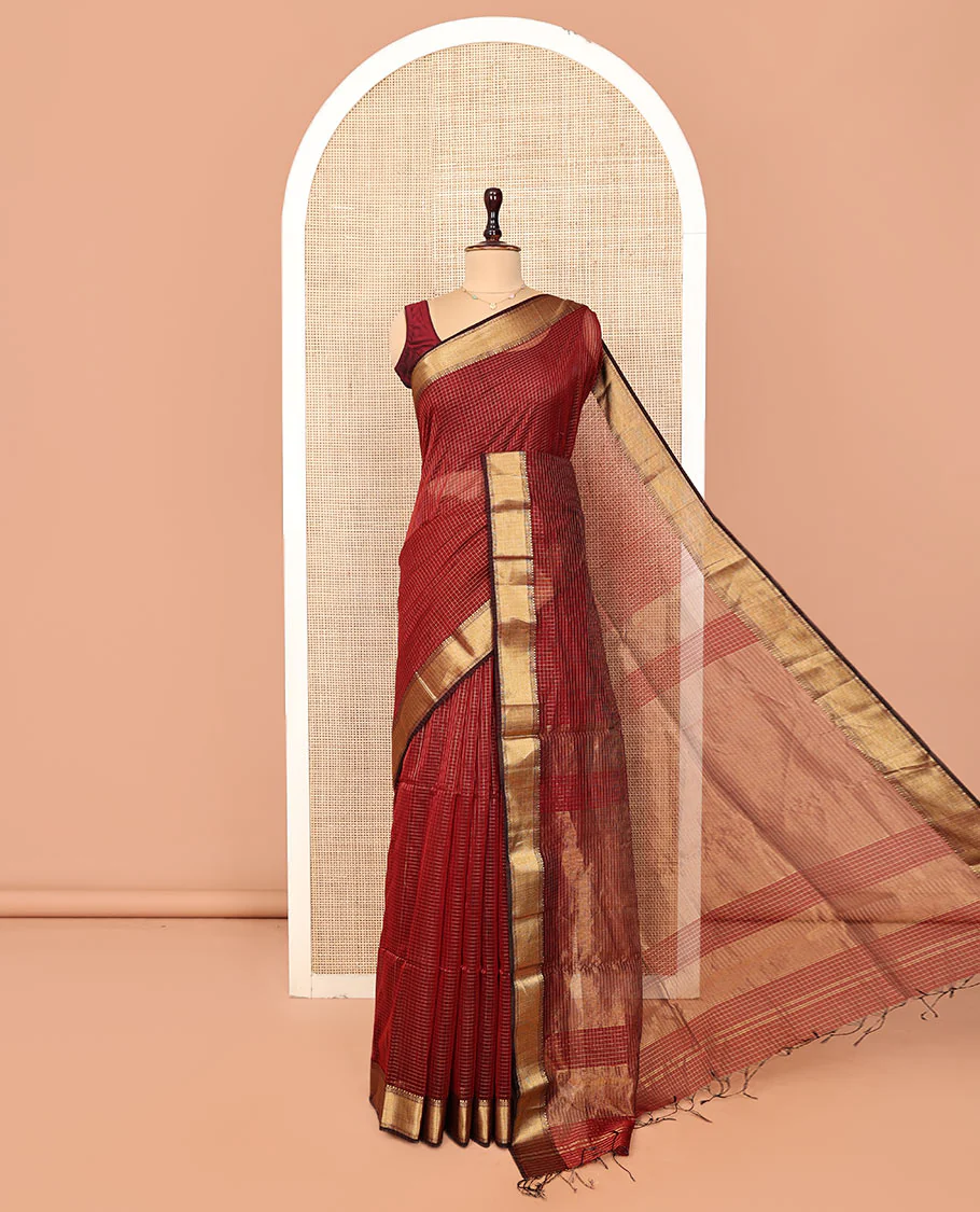 Red Maheshwari Cotton Saree, Subtly Sparkled by Zari Checks, Highlighted by a Traditional Zari Border, Gleaming Zari Decked Up Pallu, and Paired with a Matching Blouse