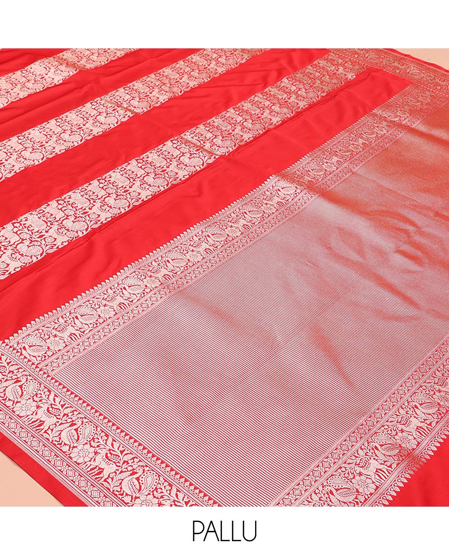 Red Mushuru Silk Saree, Gracefully Embellished with Vertically Woven Flora-Fauna Zari Designs On Its Body, Highlighted by Zari Border of Peacock and Deer Motifs, Grand Pallu, and Paired with a Plain Blouse - Image 5