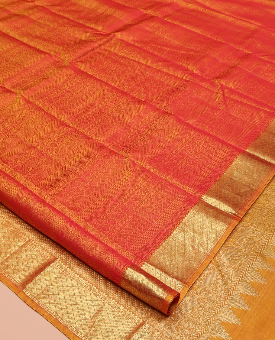 Red Parampara Silk Saree, Subtly Sparkled With Geometric Embossed Patterns in Its Body, Highlighted by Contrast Jaal Design Zari Border, Pallu of Mayil Kann and Yaali Designs , and Paired with a Contrast Blouse - Image 2