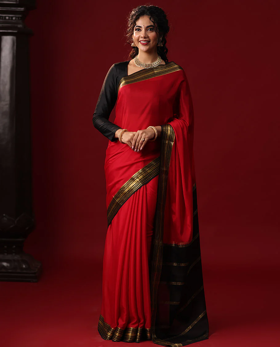 Red Plain Mysore Silk Saree, Complemented by Captivating Contrast Border of Traditional Zari Designs, Gleaming Pallu of Zari Stripes, and Paired with a Contrast Blouse
