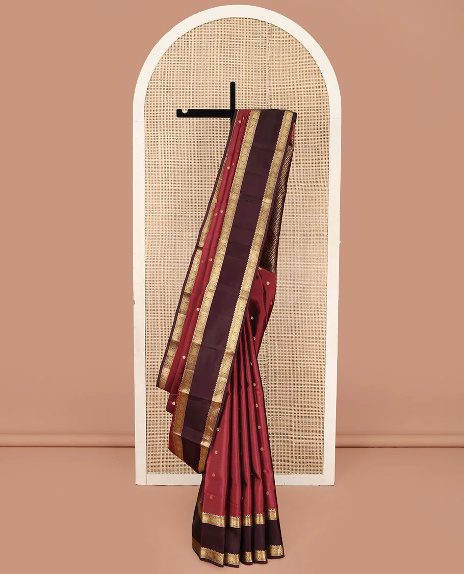 Red Vasundhara Lite Silk Mix Saree, Embellished with Zari Buttas on Its Body, Complemented by a Contrast Rettai Pettu Border of Kodi Visiry Designs, Boldly Accentuated Pallu of Jaal Designs, and Paired with a Contrast Blouse
