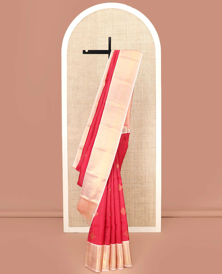 Red Vasundhara Lite Silk Mix Saree, Gleamed Up with Zari Designs All Over Its Body, Complemented by a Contrast Border of Salngai, Muthu, Diamond, Rudraksham, and Kodi Visiry Designs, Grand Woven Pallu of Jaal Designs, and Paired with a Contrast Blouse